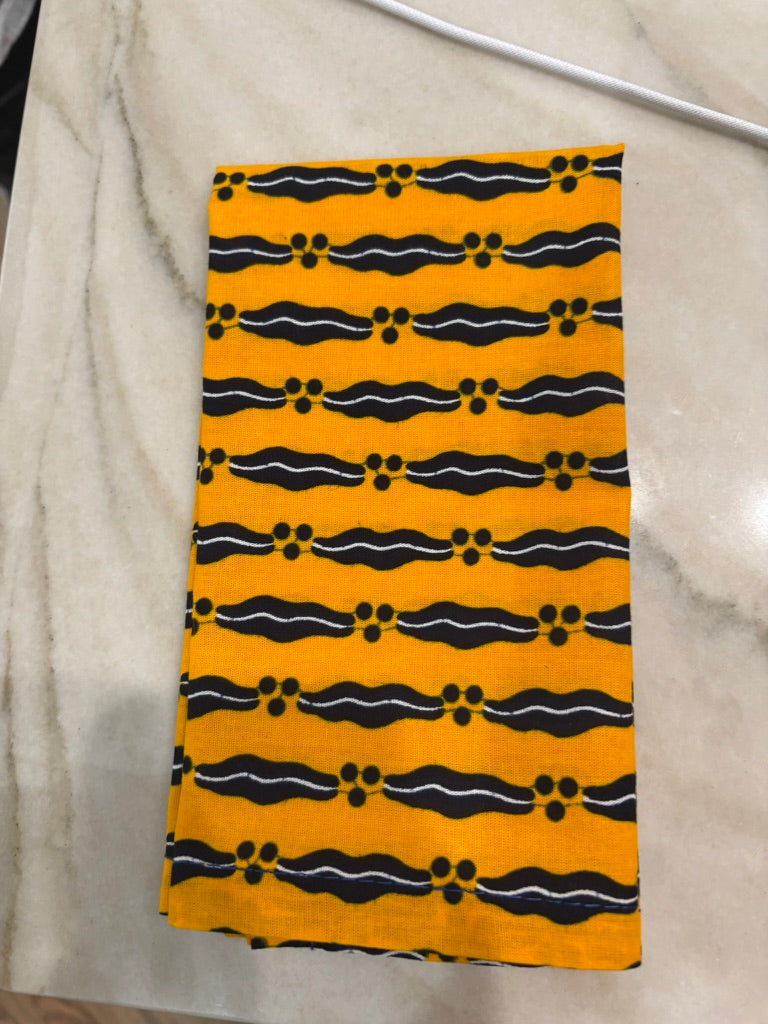 Nigerian Handcrafted Yellow and Black Napkins – Set of 4.