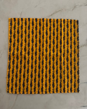 Nigerian Handcrafted Yellow and Black Napkins – Set of 4.